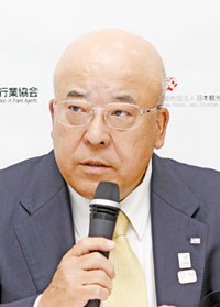  田川博己会長（記者会見にて）